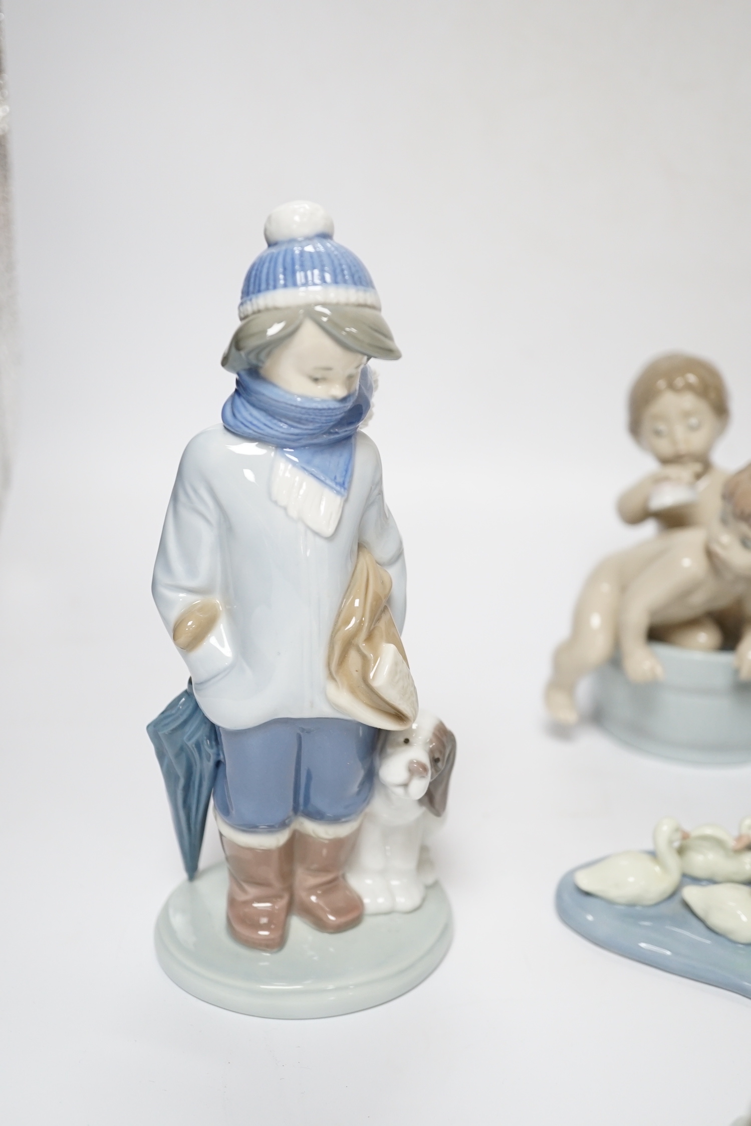 Five Lladro figure groups, Follow Me, Hurry Up, Bathtime, Interrupted Nap and another, four boxed